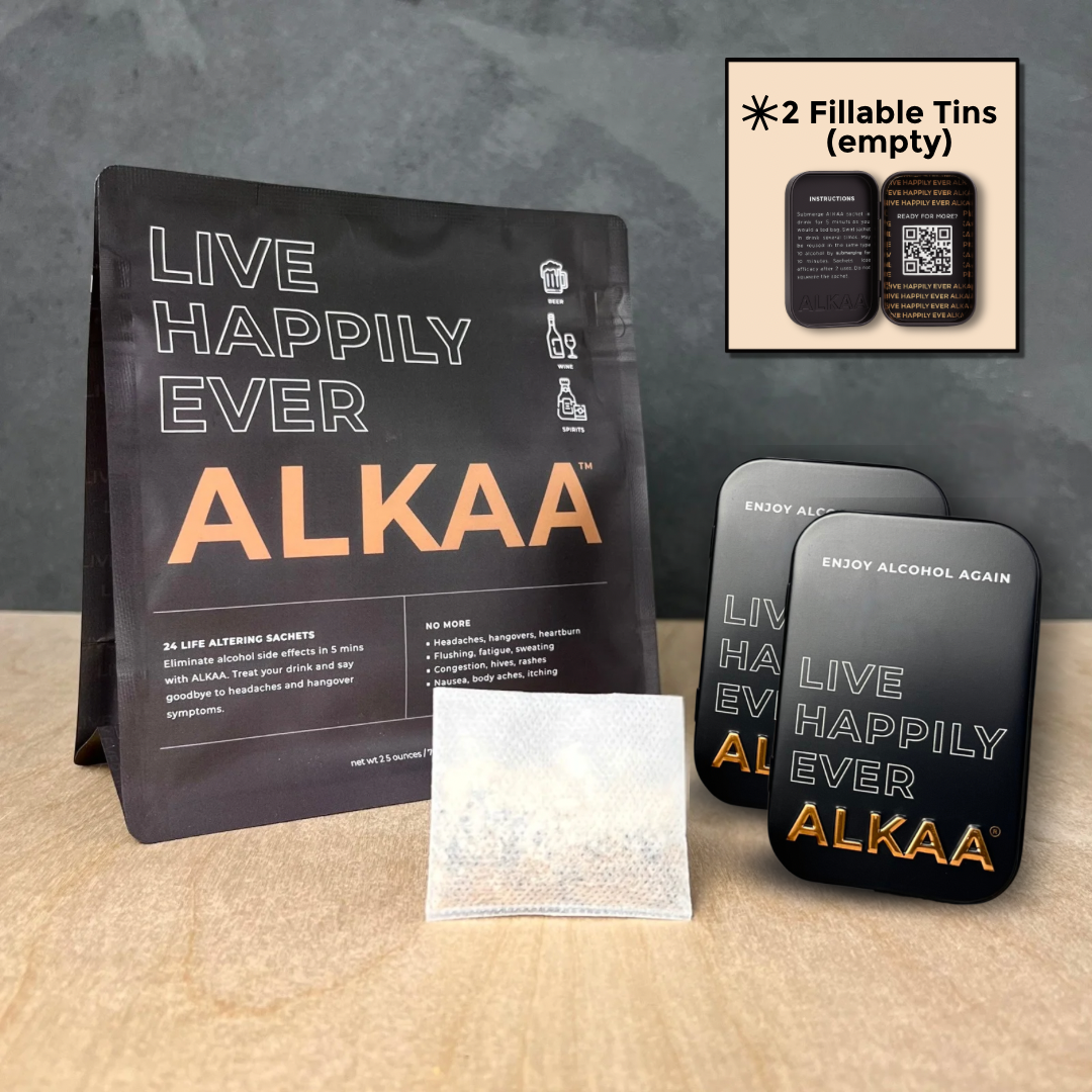 Pouch, Regular Sachet, and two tins shown on background of wood and slate.